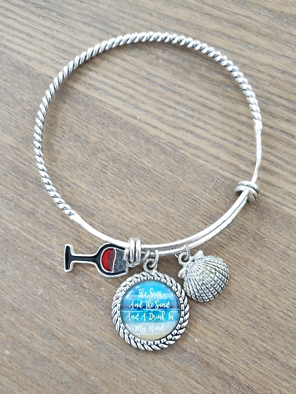 Silver-tone Charm Bangle Bracelet with Beach and Wine Charms - Blue Accent